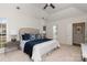 Spacious bedroom showcasing a tray ceiling and tasteful furnishings at 17521 Cambridge Grove Dr, Huntersville, NC 28078