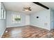 Comfortable living room featuring hardwood floors, a ceiling fan, and bright natural light at 1876 Rollins Dr, Catawba, NC 28609