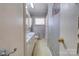 Bathroom with tile flooring, double sinks, and neutral walls at 1900 E Dixon Blvd, Shelby, NC 28152