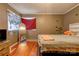 Bedroom featuring a hardwood floor, lots of light, and fun decor at 1900 E Dixon Blvd, Shelby, NC 28152