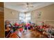 Bedroom featuring hardwood floors, a ceiling fan, and lots of toys at 1900 E Dixon Blvd, Shelby, NC 28152