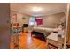 Bedroom featuring a hardwood floor, lots of light, and colorful decor at 1900 E Dixon Blvd, Shelby, NC 28152