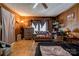 A bedroom with wood paneling, ceiling fan, and built-in storage, offering a cozy space at 1900 E Dixon Blvd, Shelby, NC 28152