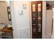 Bathroom with sleek vessel sink, modern light fixture, and built-in cabinet for storage at 198 Clouse Ln, Taylorsville, NC 28681