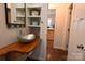 Modern bathroom with vessel sink, wood vanity, and view of kitchen at 198 Clouse Ln, Taylorsville, NC 28681