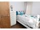 Bedroom with a white dresser and double bed at 198 Clouse Ln, Taylorsville, NC 28681