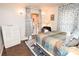 Bedroom boasts a cozy bed, walk-in closet with curtains, and calming decor at 198 Clouse Ln, Taylorsville, NC 28681