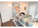 Bright bedroom with a dresser, comfortable bed, and walk-in closet at 198 Clouse Ln, Taylorsville, NC 28681