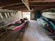 Enclosed boat storage shows a well-kept red motorboat and multiple kayaks at 198 Clouse Ln, Taylorsville, NC 28681