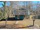 Two-story lake house featuring a full-length deck providing ample outdoor space at 198 Clouse Ln, Taylorsville, NC 28681
