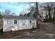 Charming outbuilding, shed with an American flag at 198 Clouse Ln, Taylorsville, NC 28681