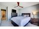 Charming bedroom with a queen bed and access to laundry room at 19906 Catamaran Ct, Cornelius, NC 28031