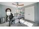 Bright home office with desk, chair, and ample natural light at 19906 Catamaran Ct, Cornelius, NC 28031