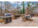 Large deck with built-in grill and comfortable seating area at 2044 Chameleon Rd, York, SC 29745