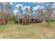 Brick house with a landscaped yard and a walkway leading to the front door at 2044 Chameleon Rd, York, SC 29745