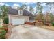 Two-car garage with a screened porch and a backyard at 2044 Chameleon Rd, York, SC 29745