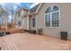 Back exterior view of house with deck and landscaping at 2044 Chameleon Rd, York, SC 29745