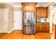 Kitchen with stainless steel refrigerator and custom wood cabinetry at 2044 Chameleon Rd, York, SC 29745