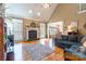 Living room with hardwood floors, fireplace, and large windows at 2044 Chameleon Rd, York, SC 29745