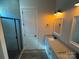 Bathroom with shower, double vanity, and modern fixtures at 2045 Cordia Cir, Newton, NC 28658