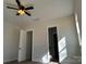 Bedroom with ceiling fan, access to bathroom and another room at 2045 Cordia Cir, Newton, NC 28658