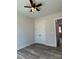 Spacious bedroom with ceiling fan and double door closet at 2045 Cordia Cir, Newton, NC 28658