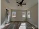 Bright bedroom with wood-look flooring and large windows at 2045 Cordia Cir, Newton, NC 28658