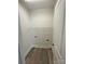 Laundry room with vinyl flooring and overhead shelving at 2045 Cordia Cir, Newton, NC 28658