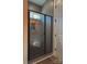 Modern shower with frameless glass doors and tile surround at 2045 Cordia Cir, Newton, NC 28658