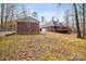 Brick house with attached garage and a large backyard at 2113 Sweet Clover Way, Denver, NC 28037