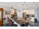 Modern kitchen with white cabinets, granite island, and stainless steel appliances at 2113 Sweet Clover Way, Denver, NC 28037