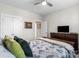 Well-lit bedroom with a double bed and built-in dresser at 2408 Rozzelles Ferry Rd, Charlotte, NC 28208