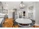 Bright dining area with marble table and four chairs at 2408 Rozzelles Ferry Rd, Charlotte, NC 28208