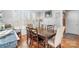 Formal dining room with hardwood floors and large windows at 2408 Rozzelles Ferry Rd, Charlotte, NC 28208