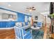 Living area with hardwood floors, stone fireplace, and a view of the kitchen at 2408 Rozzelles Ferry Rd, Charlotte, NC 28208