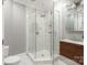 Modern bathroom with a glass shower enclosure, sleek fixtures, and vanity at 2907 Cutter Ct, Waxhaw, NC 28173