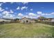 Spacious backyard featuring a wooden fence and a deck at 2935 Dairy Farm Dr, Monroe, NC 28110