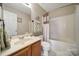 Well-maintained bathroom featuring a shower-tub combo and traditional vanity at 2935 Dairy Farm Dr, Monroe, NC 28110