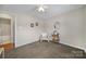 Cozy bedroom with carpeted floors and an ensuite bathroom at 2935 Dairy Farm Dr, Monroe, NC 28110