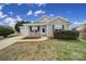 Charming home with a covered porch and a well-manicured front yard at 2935 Dairy Farm Dr, Monroe, NC 28110