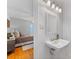 Small bathroom with pedestal sink and view of bedroom at 3019 Parkstone Dr, Charlotte, NC 28210