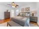 Spacious bedroom with hardwood floors and ceiling fan at 3019 Parkstone Dr, Charlotte, NC 28210