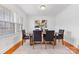 Bright dining area with hardwood floors and neutral walls at 3019 Parkstone Dr, Charlotte, NC 28210