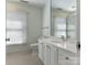 Bathroom features a large mirror and great natural light at 3041 Valencia Ter, Charlotte, NC 28211