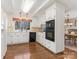 Spacious white kitchen with built-in appliances, ample cabinet space, and hardwood floors at 3041 Valencia Ter, Charlotte, NC 28211