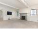 Bright living room with a fireplace, front door, and view of a side room at 3041 Valencia Ter, Charlotte, NC 28211