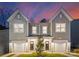 Two-story townhouses with attached garages and modern design at 3108 Amay James Ave, Charlotte, NC 28208