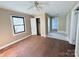 Bedroom with hardwood floors, a closet, and access to a bathroom at 350 Turnersburg Hwy, Statesville, NC 28625