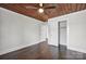 Spacious bedroom with hardwood floors and wood ceiling at 400 E 27Th St, Kannapolis, NC 28083