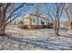 Side view of charming craftsman home with snowy yard at 400 E 27Th St, Kannapolis, NC 28083